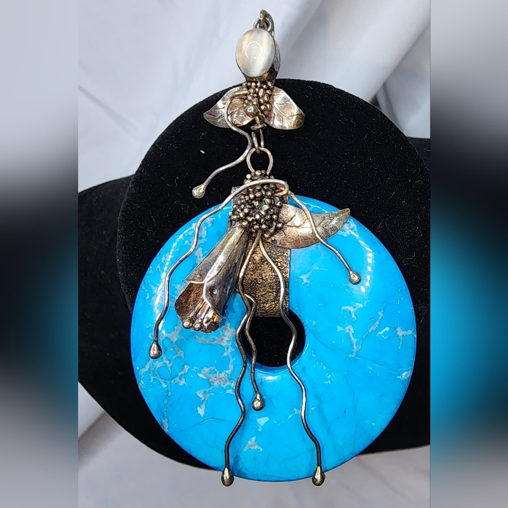 Artisn blue turquoise and sterling silver pendant